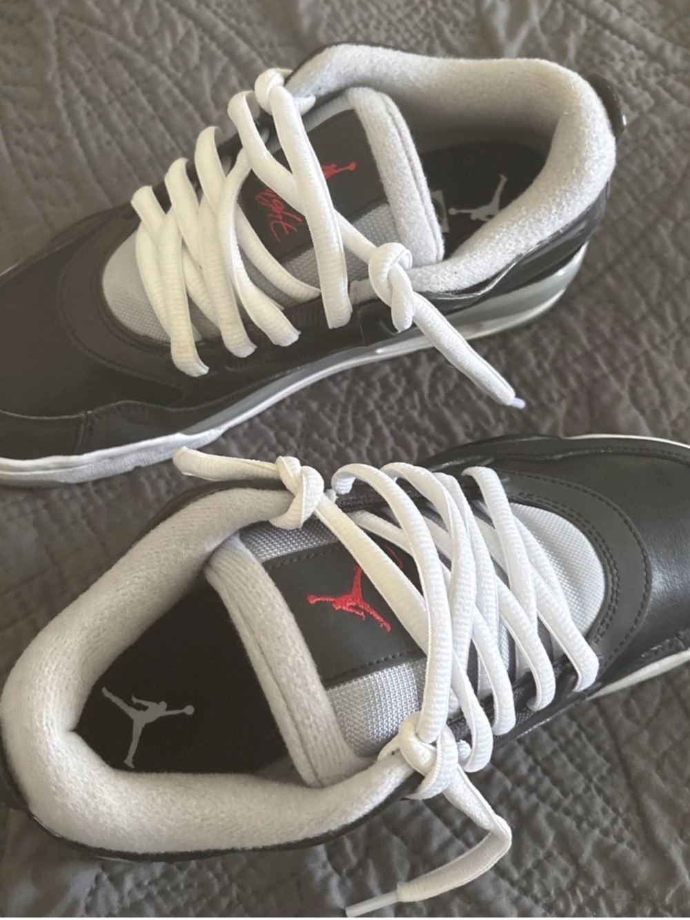 Nike Black and White Low-Top Sneakers with Red Logo